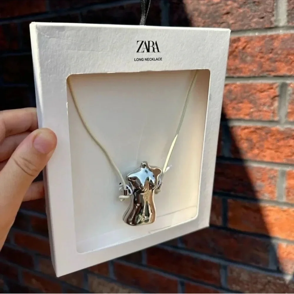 ZARA BUST CHARM NECKLACE